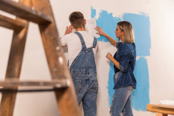 istock Planning further steps after painting the walls 1288802400