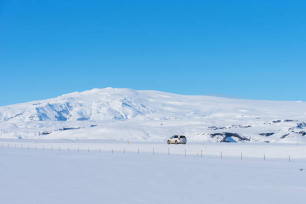istock Typical Icelandic winter landscape with mountains under the snow and blue sky. 1288804683