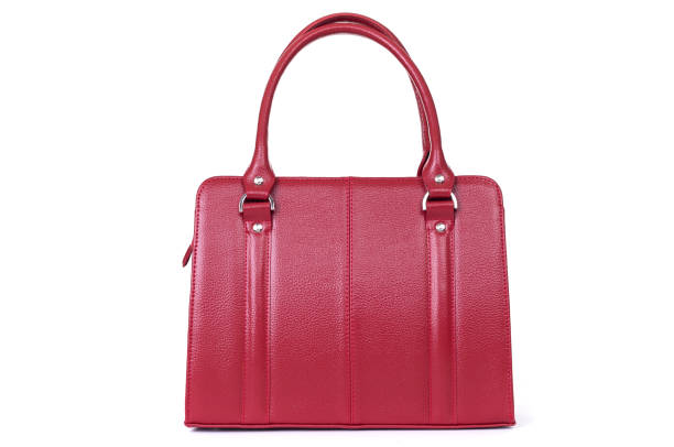istock red leather hand made bag on a white background 1288804701