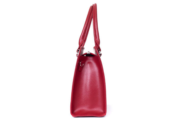 istock female black leather bag sideways isolated on a white background 1288804705