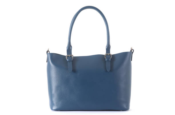 istock leather female blue bag on the handle on a white background 1288804706