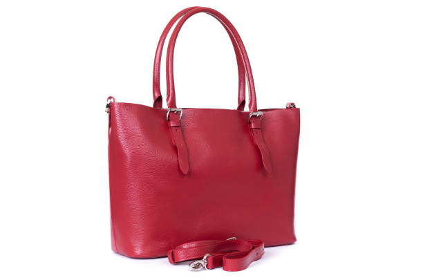 istock women red leather bag isolated on white background 1288804722