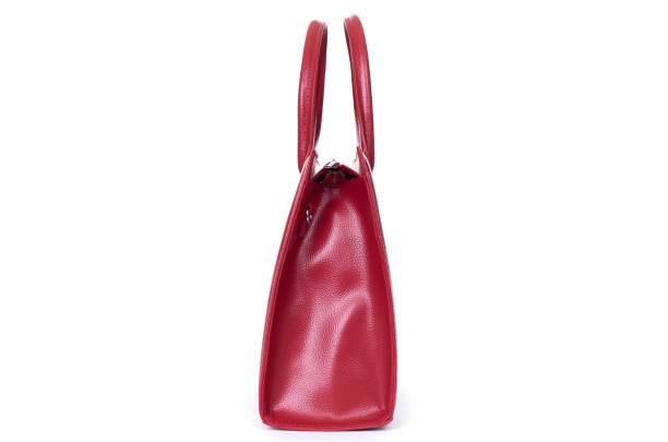 istock female black leather bag sideways isolated on a white background 1288804747