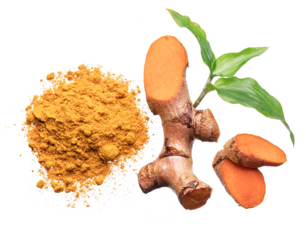 istock Fresh turmeric rhizome and turmeric powder isolated on white background. 1288805676