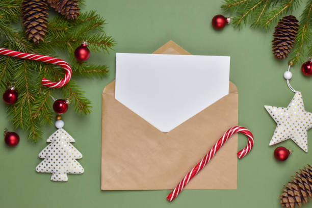 istock New year's composition with an envelope and a letter. Wish list. Envelope for Santa. New year's shopping list. 1288806618