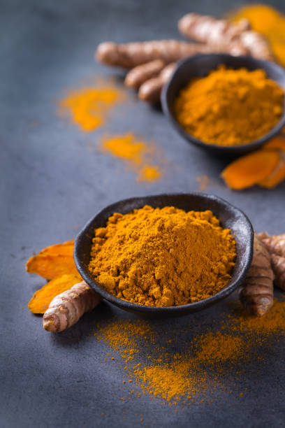 istock Turmeric root curcuma longa powder, superfood, spices 1288808476