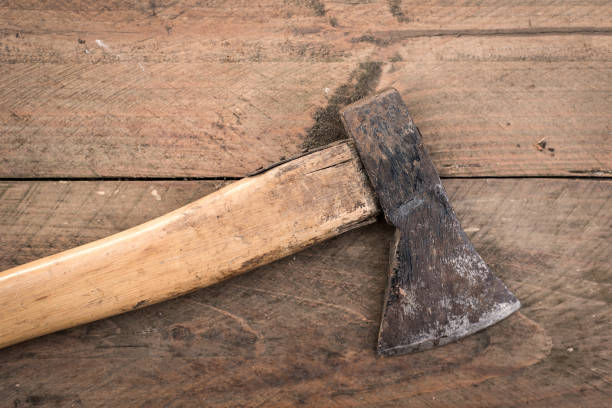 istock Old used axe on a wooden 1288814387