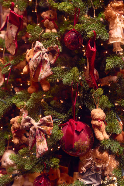istock Christmas fir tree decorations with baubles and lights 1288817441