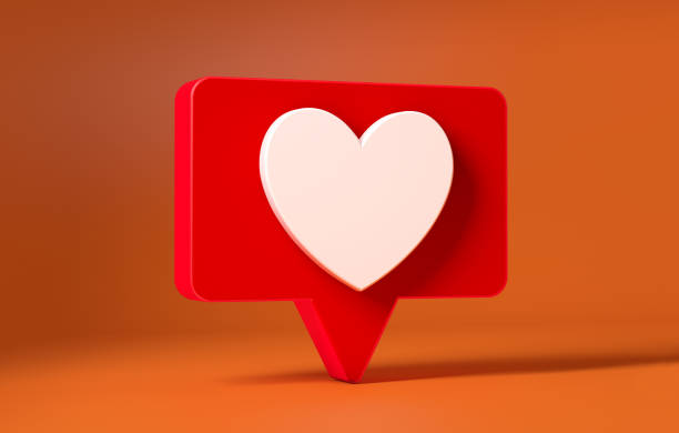 istock Like heart icon isolated on orange background in a square 1288818563
