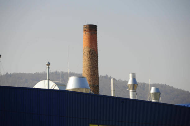 industrial chimney at an industrial production location, pollutant emissions in the industry