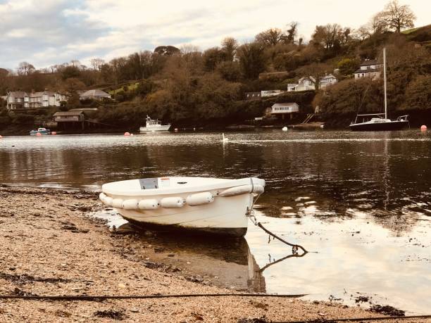 istock White dinghy at Restronguet Point. 1288822872