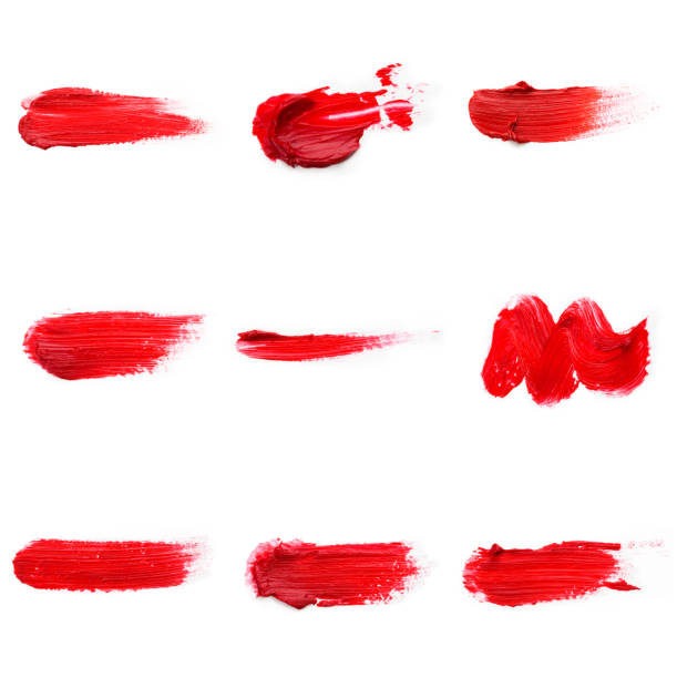 istock Red colored brush stroke paiting over isolated background, canvas watercolor texture, red lipstick smudge 1288828630