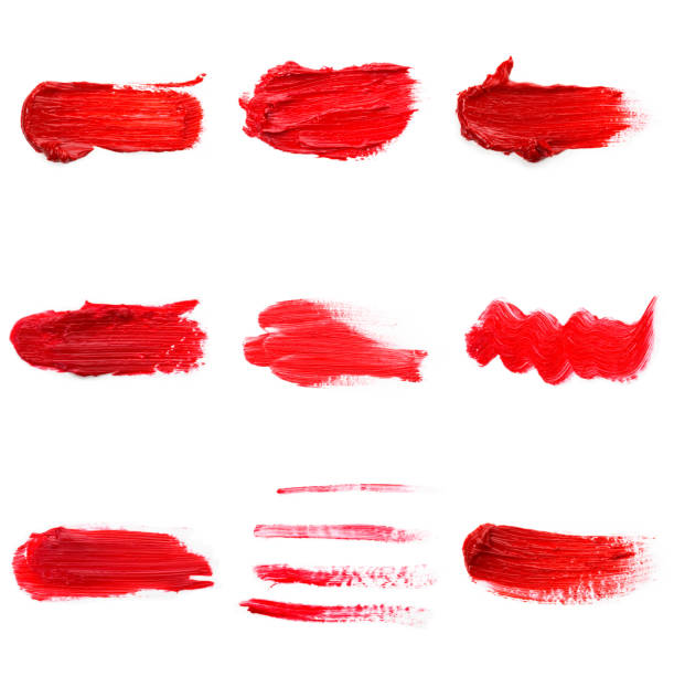istock Red colored brush stroke paiting over isolated background, canvas watercolor texture, red lipstick smudge 1288828705