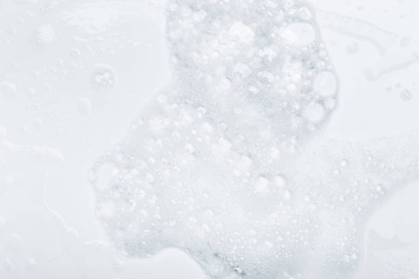 istock Foam bubble from soap or shampoo for washing isolated on white background from above 1288828772