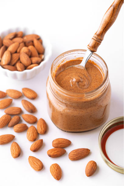 istock Fresh almond butter with raw almonds with copy space 1288829805