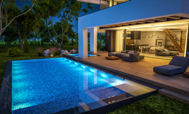 3d rendering of modern house in luxurious style in night 3d rendering of modern cozy house with pool and parking for sale or rent in luxurious style and beautiful landscaping on background. Clear summer night with many stars on the sky. tree 3d perspective stock pictures, royalty-free photos & images