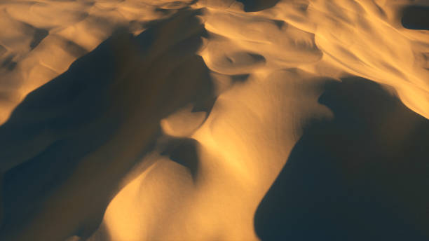 istock Flight in the endless hot desert over the dunes and sandy mountains. 3d illustration 1288833506