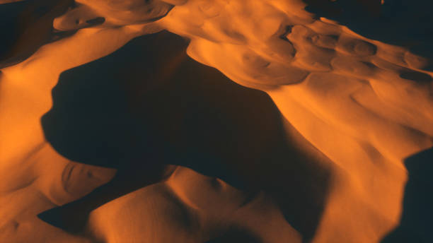 istock Flight in the endless hot desert over the dunes and sandy mountains. 3d illustration 1288833510