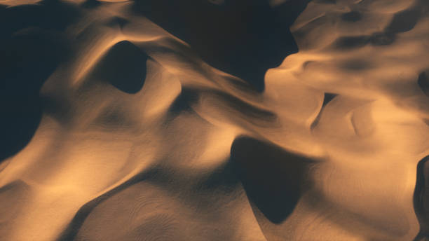 istock Flight in the endless hot desert over the dunes and sandy mountains. 3d illustration 1288833549