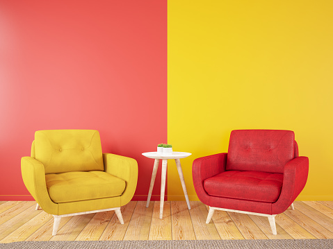 Armchairs Divided in Half into Two Parts in the Middle. Yellow Red Modern and Colorful Cozy Concept. 3d Render