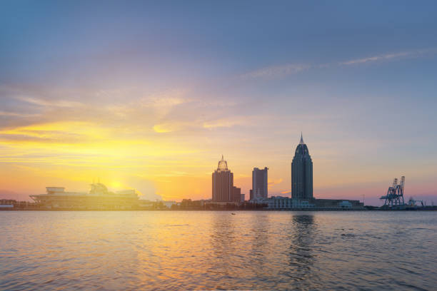 istock Mobile, Alabama, USA downtown skyline on the river 1288836148