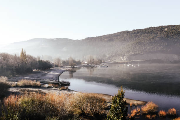 View of Lake Lacar in the province of Neuquen in Argentina in the early morning during Autumn in Patagonia. View of Lake Lacar in the province of Neuquen in Argentina in the early morning during Autumn. lácar lake photos stock pictures, royalty-free photos & images