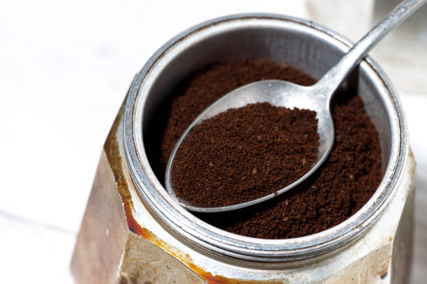 istock ground coffee and spoon in geyser coffee machine 1288840173
