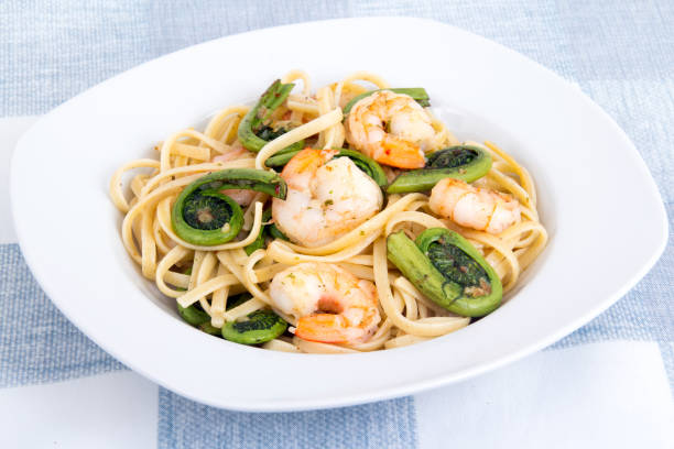 istock garlic linguini with shrimp and fiddlehead fern 1288842164