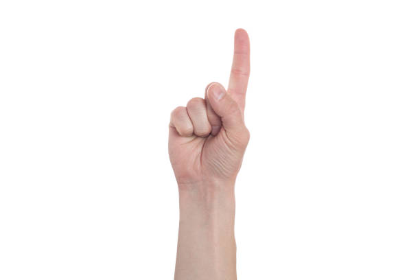 istock Man showing number one on white background 1288842861