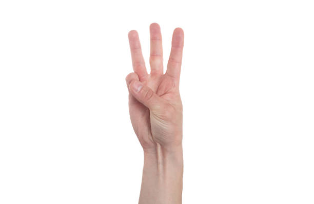 istock Man showing number three on white background, closeup. 1288842897