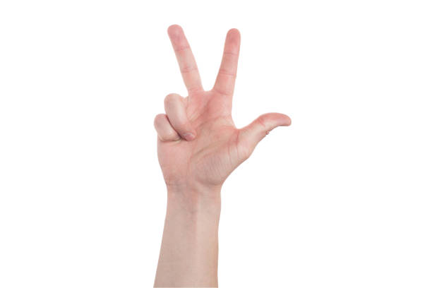 istock Man showing number three on white background, closeup. 1288842931