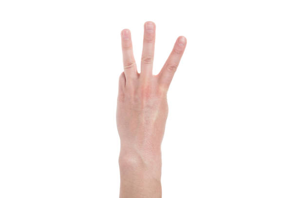 Child Hand making number three on white background