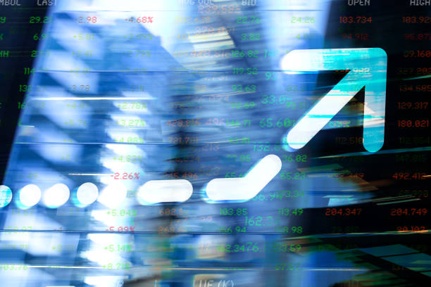 istock Finance. Arrow. Abstract office buildings and Trading Screen Data. 1288848754