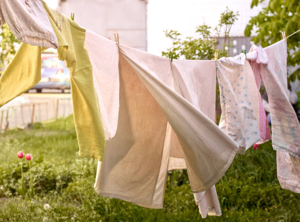 istock Washed clothes on the street. 1288850317