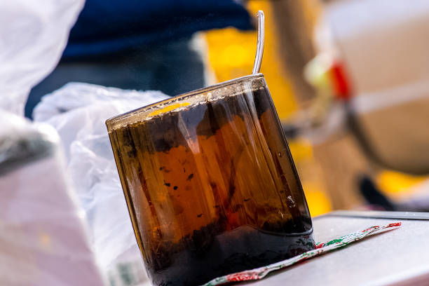 istock Transparent mug with tea. Brewing tea in bag. 1288850566