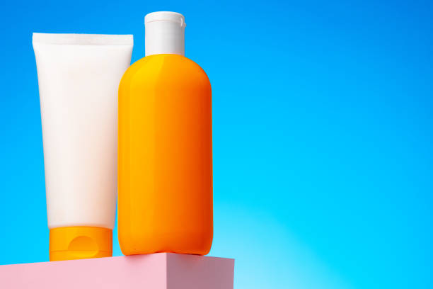 istock Skincare beauty products container against blue background 1288851819