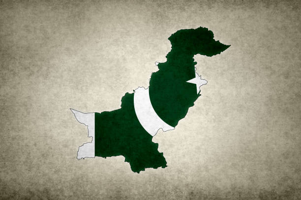Grunge map of Pakistan with its flag printed within its border on an old paper.