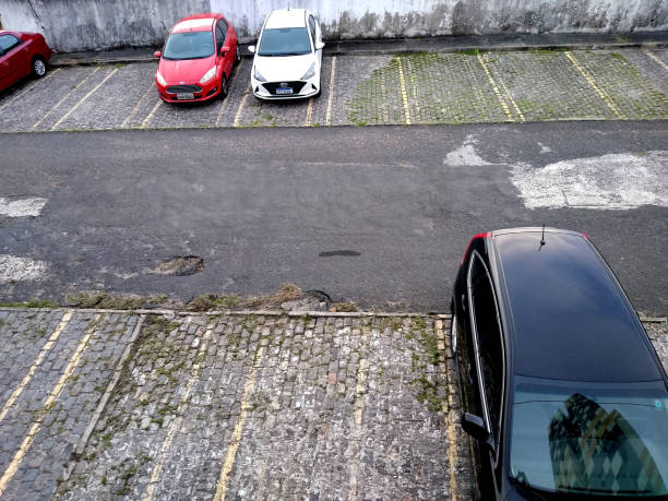 salvador, bahia, brazil - october 25, 2020: vehicles are seen in the courtyard of a residential condominium parking lot in the city of Salvador.