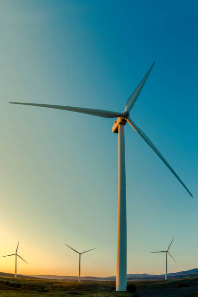 istock Wind mills in the mountains at dawn. 1288852887