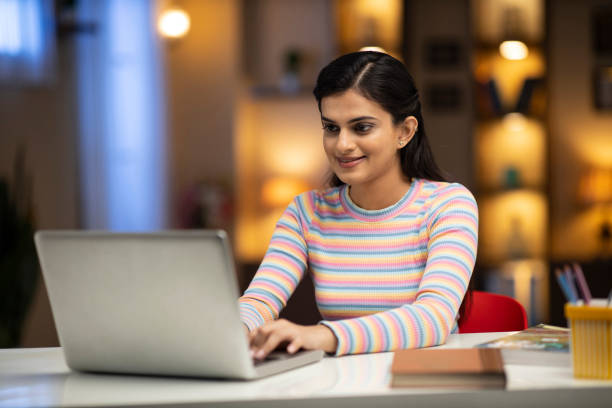 istock woman studying at home 1288852940