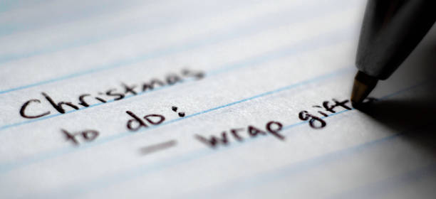 istock Christmas to do list written on notebook for organization 1288854947