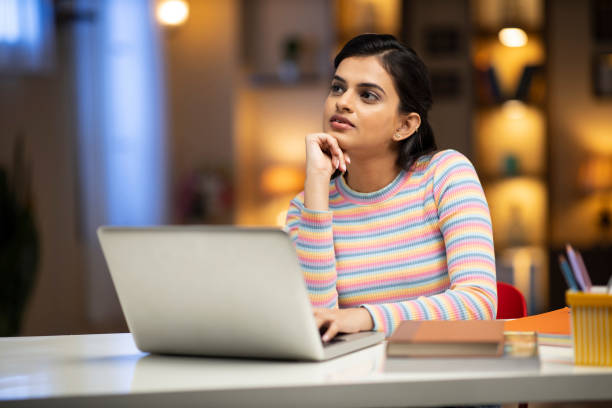 istock woman studying at home 1288857469