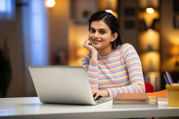 istock woman studying at home 1288859375