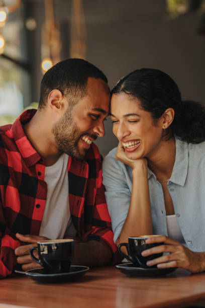 istock Romantic couple on a date in a cafe 1288861770
