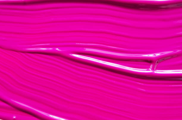 istock Texture of pink lipstick or acrylic paint background. - Image 1288862968