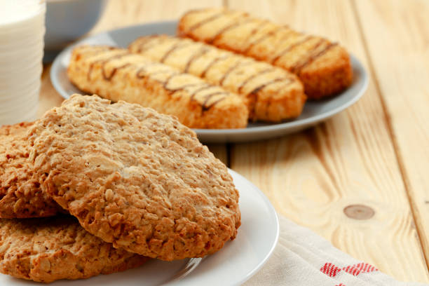 istock Shortbread cookies on wooden board close up 1288867581