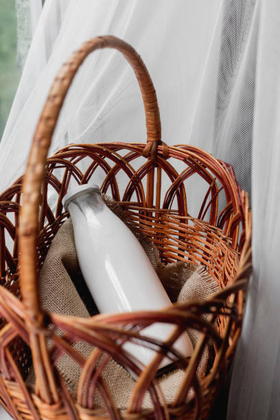 istock A bottle of milk lies in a basket 1288868607