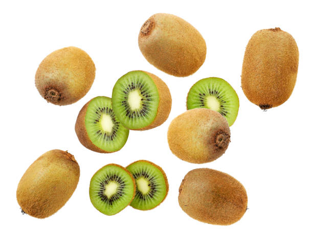 istock Kiwi whole and half falling on a white background. Isolated 1288870352