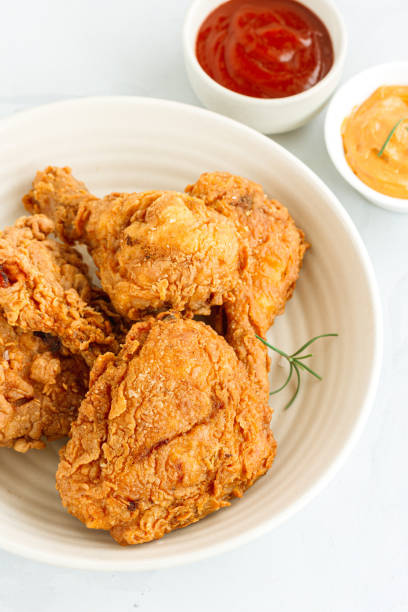 istock Crispy Fried Chicken with Ketchup and Sauce Vertical Directly Above Photo 1288872894