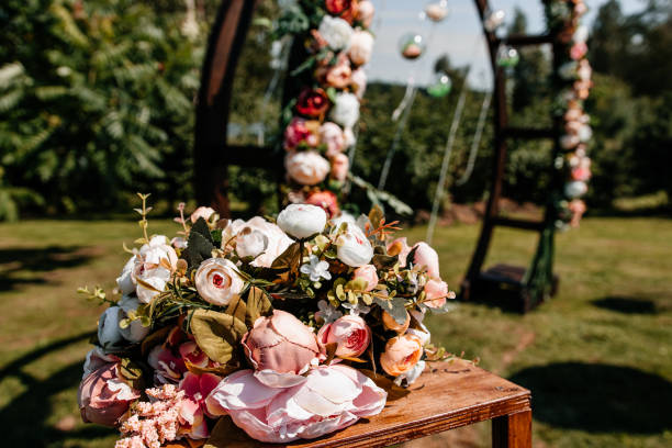 istock Floral decor wedding arch with roses 1288878412